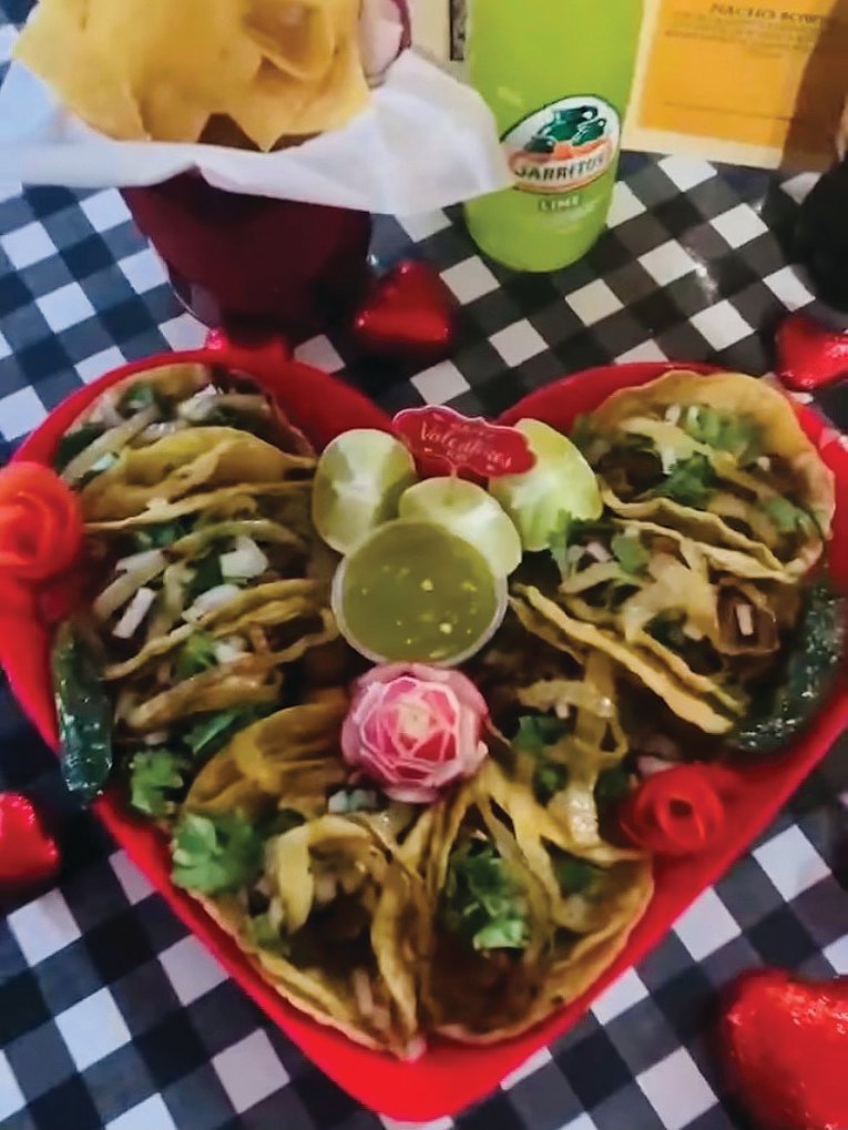 This heart shaped taco platter sits, ready for romance, at Paleteria La Victoria.
